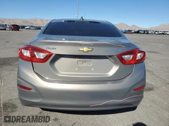 ✅ 2017 Chevrolet Cruze LT • VIN: 1G1BE5SM2H7210036 • Lot: 90130525. Listed on Copart with 66,230 mi. Free auction sales archive from the USA and detailed vehicle history report at DreamBid. Image 6.