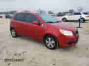 2011 Chevrolet Aveo 1LT z VIN KL1TD6DEXBB132191, wystawiony jako Copart lot #87774475 z przebiegiem 102 416 mil mil oraz Czysty tytuł • Clean title. Historia ofert i sprzedaży dostępna na DreamBid. Obrazek 4.