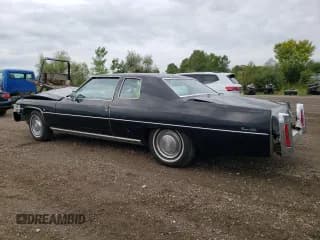 ✅ 1974 Cadillac DeVille • VIN: 6D47R4Q186752 • Lot: 67941264. Listed on Copart with 31,515 mi. Free auction sales archive from the USA and detailed vehicle history report at DreamBid. Image 2.