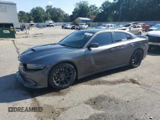 ✅ 2022 Dodge Charger Scat Pack • VIN: 2C3CDXGJ6NH161811 • Лот: 65273005. Опубликован ранее на Copart с пробегом 77 124 миль. Бесплатный доступ к архиву аукционных продаж из США и подробный отчёт об истории автомобиля на DreamBid. Изображение 1.