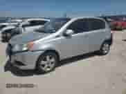 2009 Chevrolet Aveo 1LT with VIN KL1TD66E09B338773, listed as a Copart auction lot 52575765 with 102,617 mi miles and Salvage title. Bid and sale history available at DreamBid. Image 1.