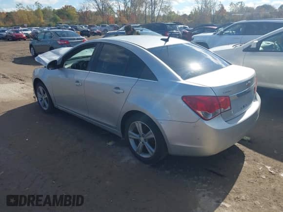 2013 Chevrolet Cruze 2LT with VIN 1G1PE5SB2D7245528, listed as a IAAI auction lot 43503941 with 173,810 mi miles and . Bid and sale history available at DreamBid. Image 3.
