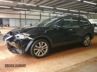 ✅ 2013 Mazda CX-9 Grand Touring • VIN: JM3TB2DA6D0410613 • Lot: 68643105. Wystawiony na Copart z przebiegiem 132 124 mil. Bezpłatny archiwum sprzedaży aukcyjnych z USA i szczegółowy raport historii pojazdu na DreamBid. Zdjęcie 1.