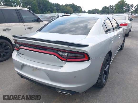 ✅ 2023 Dodge Charger SXT • VIN: 2C3CDXBG4PH508762 • Lot: 43052768. Listed on IAAI with 39,616 mi. Free auction sales archive from the USA and detailed vehicle history report at DreamBid. Image 4.