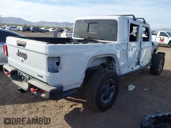 ✅ 2021 Jeep Gladiator Rubicon • VIN: 1C6JJTBM6ML588033 • Lot: 41712780. Listed on IAAI with 26,058 mi. Free auction sales archive from the USA and detailed vehicle history report at DreamBid. Image 4.