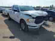 2024 Ram 1500 SLT with VIN 1C6RR6GG3RS128728, listed as a IAAI auction lot 41598041 with 24,872 mi miles and . Bid and sale history available at DreamBid. Image 1.