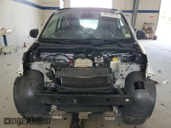 ✅ 2016 Smart fortwo Passion • VIN: WMEFJ5DA2GK139148 • Lot: 70122315. Wystawiony na Copart z przebiegiem 59 684 mil. Bezpłatny archiwum sprzedaży aukcyjnych z USA i szczegółowy raport historii pojazdu na DreamBid. Zdjęcie 5.