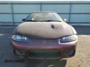 ✅ 1999 Mitsubishi Eclipse GS • VIN: 4A3AK44Y1XE074155 • Лот: 77143944. Опубликован ранее на Copart с пробегом 105 262 миль. Бесплатный доступ к архиву аукционных продаж из США и подробный отчёт об истории автомобиля на DreamBid. Изображение 5.