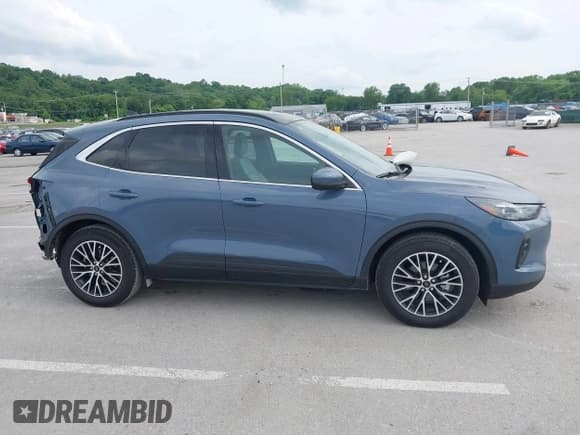 ✅ 2024 Ford Escape PHEV • VIN: 1FMCU0E15RUA14352 • Lot: 42309495. Listed on IAAI with 21,675 mi. Free auction sales archive from the USA and detailed vehicle history report at DreamBid. Image 13.