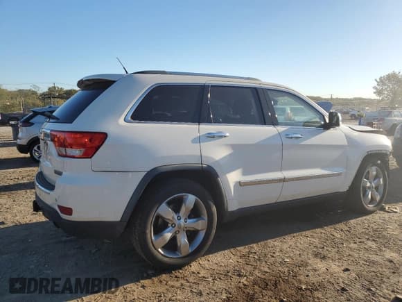 ✅ 2012 Jeep Grand Cherokee Overland • VIN: 1C4RJFCG3CC345994 • Lot: 86448425. Listed on Copart with 126,138 mi. Free auction sales archive from the USA and detailed vehicle history report at DreamBid. Image 3.