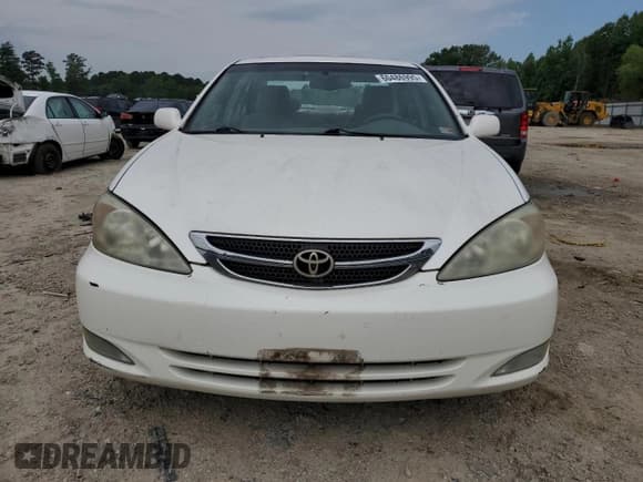 ✅ 2004 Toyota Camry LE • VIN: JTDBE32K440281087 • Лот: 60486995. Опубликован ранее на Copart с пробегом 229 856 миль. Бесплатный доступ к архиву аукционных продаж из США и подробный отчёт об истории автомобиля на DreamBid. Изображение 6.