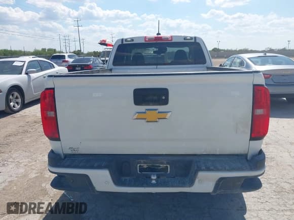 ✅ 2020 Chevrolet Colorado 4WD LT • VIN: 1GCHTCEA6L1163215 • Lot: 43206313. Listed on IAAI with 144,189 mi. Free auction sales archive from the USA and detailed vehicle history report at DreamBid. Image 16.