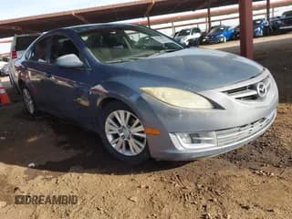 ✅ 2009 Mazda 6 i Touring • VIN: 1YVHP82A695M36574 • Лот: 41732093. Опубликован ранее на IAAI с пробегом 216 408 миль. Бесплатный доступ к архиву аукционных продаж из США и подробный отчёт об истории автомобиля на DreamBid. Изображение 1.