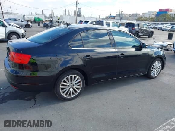 ✅ 2014 Volkswagen Jetta TDI w/Premium/Nav • VIN: 3VWLL7AJ3EM404934 • Lot: 42809693. Listed on IAAI with 142,331 mi. Free auction sales archive from the USA and detailed vehicle history report at DreamBid. Image 4.