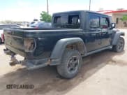 ✅ 2022 Jeep Gladiator Rubicon • VIN: 1C6JJTBM3NL165377 • Lot: 42020584. Listed on IAAI with 87,433 mi. Free auction sales archive from the USA and detailed vehicle history report at DreamBid. Image 4.