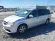 2012 Dodge Grand Caravan SXT z VIN 2C4RDGCG3CR196667, wystawiony jako IAAI lot #43337805 z przebiegiem 167 558 mil mil oraz . Historia ofert i sprzedaży dostępna na DreamBid. Obrazek 2.