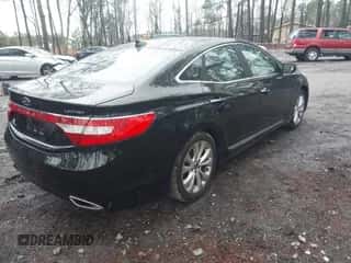 2014 Hyundai Azera Limited с VIN KMHFH4JG3EA376873, выставлен на аукционе IAAI как лот 41530698 с пробегом 94 263 миль миль и . История ставок и продаж доступна на DreamBid. Изображение 4.