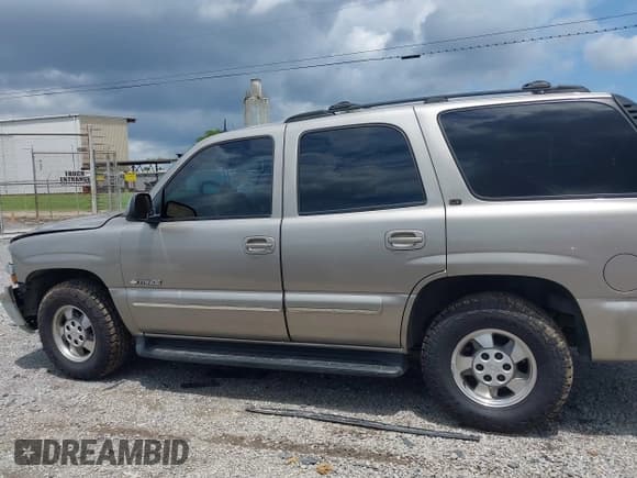 ✅ 2003 Chevrolet Tahoe LS • VIN: 1GNEC13Z93R191440 • Lot: 42627274. Listed on IAAI with 272,039 mi. Free auction sales archive from the USA and detailed vehicle history report at DreamBid. Image 14.