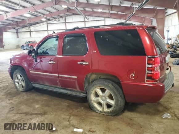 2013 Chevrolet Tahoe LTZ z VIN 1GNSKCE07DR373610, wystawiony jako Copart lot #67510235 z przebiegiem 157 323 mil mil oraz Czysty tytuł • Clean title. Historia ofert i sprzedaży dostępna na DreamBid. Obrazek 2.