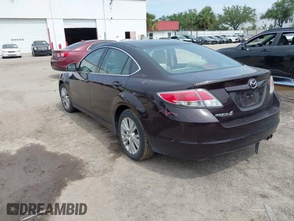 ✅ 2010 Mazda 6 i Touring • VIN: 1YVHZ8CH1A5M39358 • Lot: 42303081. Listed on IAAI with 123,435 mi. Free auction sales archive from the USA and detailed vehicle history report at DreamBid. Image 3.