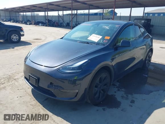 ✅ 2024 Tesla Model Y Long Range • VIN: 7SAYGDEE3RA317084 • Lot: 43374530. Wystawiony na IAAI z przebiegiem 12 885 mil. Bezpłatny archiwum sprzedaży aukcyjnych z USA i szczegółowy raport historii pojazdu na DreamBid. Zdjęcie 2.