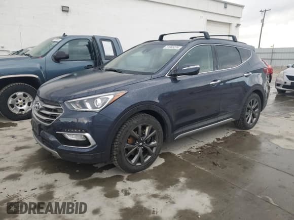 ✅ 2017 Hyundai Santa Fe Ultimate • VIN: 5XYZWDLA5HG474534 • Лот: 51905224. Опубликован ранее на Copart с пробегом 124 314 миль. Бесплатный доступ к архиву аукционных продаж из США и подробный отчёт об истории автомобиля на DreamBid. Изображение 1.