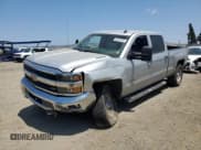 ✅ 2015 Chevrolet Silverado 2500HD LT • VIN: 1GC1KVE8XFF170673 • Lot: 59818525. Listed on Copart with 126,295 mi. Free auction sales archive from the USA and detailed vehicle history report at DreamBid. Image 1.