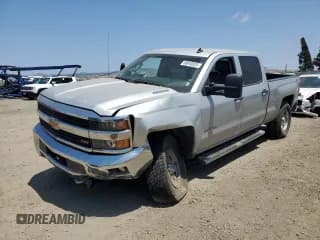 ✅ 2015 Chevrolet Silverado 2500HD LT • VIN: 1GC1KVE8XFF170673 • Lot: 59818525. Listed on Copart with 126,295 mi. Free auction sales archive from the USA and detailed vehicle history report at DreamBid. Image 1.