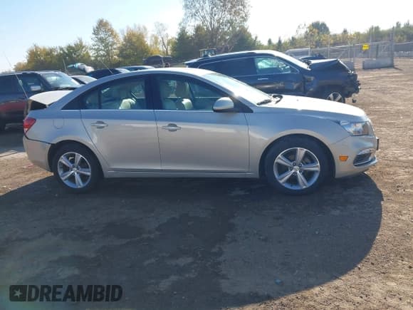 ✅ 2015 Chevrolet Cruze LT • VIN: 1G1PE5SBXF7102376 • Lot: 43539104. Listed on IAAI with 83,547 mi. Free auction sales archive from the USA and detailed vehicle history report at DreamBid. Image 13.