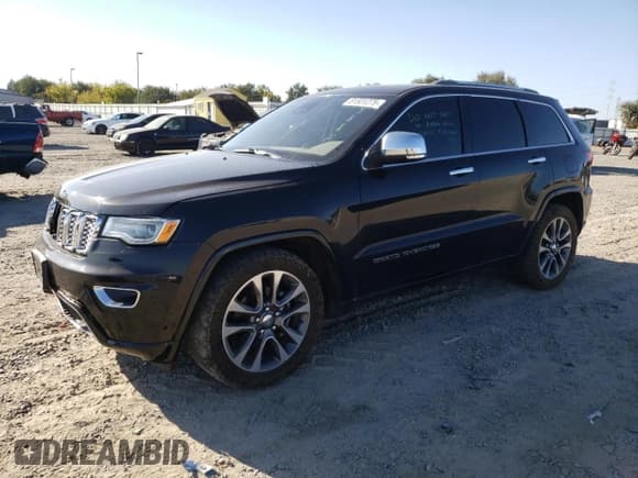 ✅ 2017 Jeep Grand Cherokee Overland • VIN: 1C4RJFCG7HC942105 • Lot: 81501275. Listed on Copart with 174,735 mi. Free auction sales archive from the USA and detailed vehicle history report at DreamBid. Image 1.