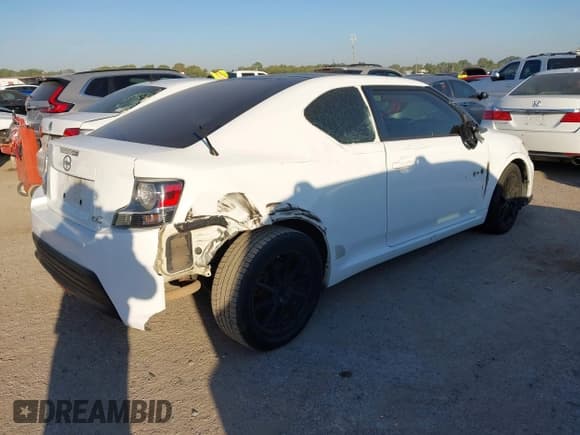 ✅ 2014 Scion tC Monogram • VIN: JTKJF5C72E3074107 • Lot: 43448713. Listed on IAAI with 84,697 mi. Free auction sales archive from the USA and detailed vehicle history report at DreamBid. Image 4.