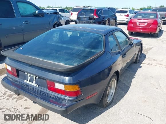 ✅ 1984 Porsche 944 • VIN: WP0AA0949EN457844 • Lot: 42171136. Listed on IAAI with 60,211 mi. Free auction sales archive from the USA and detailed vehicle history report at DreamBid. Image 4.