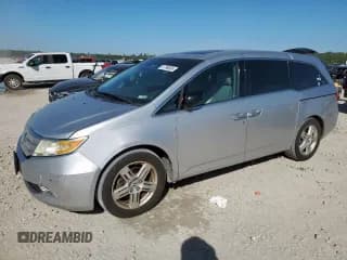 ✅ 2011 Honda Odyssey Touring • VIN: 5FNRL5H94BB064495 • Лот: 91796595. Опубликован ранее на Copart с пробегом 231 653 миль. Бесплатный доступ к архиву аукционных продаж из США и подробный отчёт об истории автомобиля на DreamBid. Изображение 1.