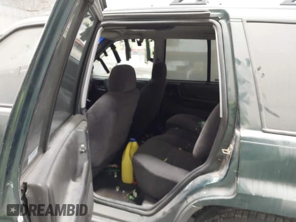 ✅ 1998 Jeep Grand Cherokee Laredo • VIN: 1J4GZ58S9WC212050 • Лот: 43608594. Опубликован ранее на IAAI с пробегом 109 048 миль. Бесплатный доступ к архиву аукционных продаж из США и подробный отчёт об истории автомобиля на DreamBid. Изображение 8.