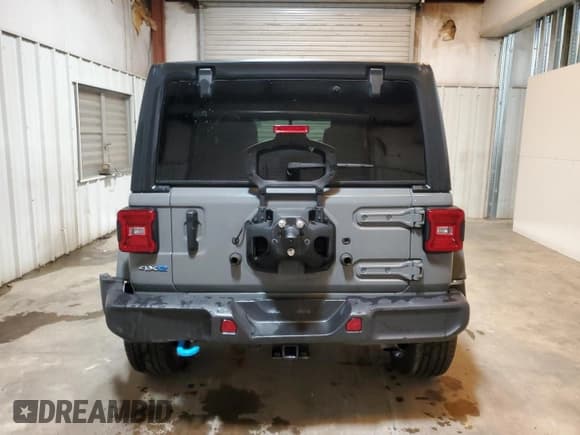 ✅ 2023 Jeep Wrangler Sahara • VIN: 1C4JJXP69PW698930 • Lot: 66679874. Listed on Copart with 9,161 mi. Free auction sales archive from the USA and detailed vehicle history report at DreamBid. Image 6.