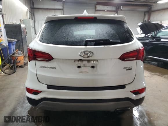 ✅ 2018 Hyundai Santa Fe 2.4L • VIN: 5NMZUDLBXJH089092 • Лот: 45015274. Опубликован ранее на Copart с пробегом 82 664 миль. Бесплатный доступ к архиву аукционных продаж из США и подробный отчёт об истории автомобиля на DreamBid. Изображение 6.