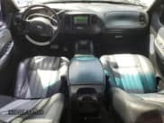 ✅ 2003 Ford F-150 Harley-Davidson • VIN: 1FTRW07383KD62463 • Lot: 49995655. Listed on Copart with 131,683 mi. Free auction sales archive from the USA and detailed vehicle history report at DreamBid. Image 8.