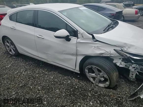 ✅ 2018 Chevrolet Cruze Premier • VIN: 3G1BF6SM1JS607103 • Lot: 86512315. Listed on Copart with 95,073 mi. Free auction sales archive from the USA and detailed vehicle history report at DreamBid. Image 13.