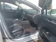 ✅ 2017 Ford Fusion Hybrid Titanium • VIN: 3FA6P0RU3HR188204 • Лот: 42618604. Опубликован ранее на IAAI с пробегом 104 609 миль. Бесплатный доступ к архиву аукционных продаж из США и подробный отчёт об истории автомобиля на DreamBid. Изображение 5.