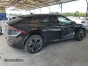 ✅ 2022 Kia EV6 GT-Line • VIN: KNDC44LA8N5030970 • Лот: 65454035. Опубликован ранее на Copart с пробегом 63 086 миль. Бесплатный доступ к архиву аукционных продаж из США и подробный отчёт об истории автомобиля на DreamBid. Изображение 3.