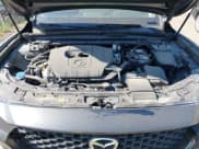 ✅ 2025 Mazda CX-50 S Preferred • VIN: 7MMVABBMXSN325856 • Lot: 42893152. Listed on IAAI with 7,482 mi. Free auction sales archive from the USA and detailed vehicle history report at DreamBid. Image 10.