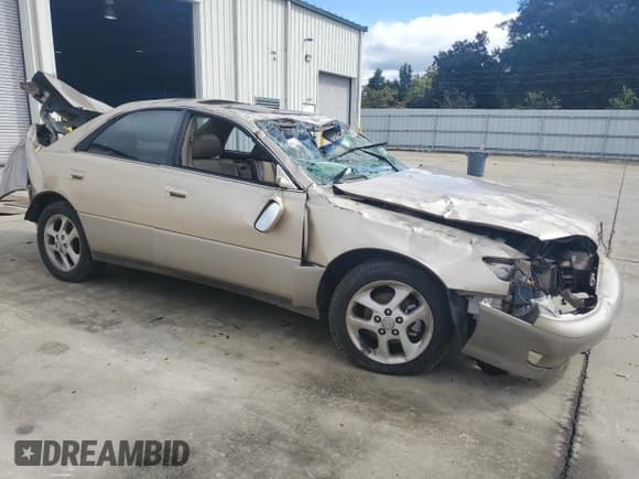 ✅ 2000 Lexus ES 300 • VIN: JT8BF28G3Y0250444 • Lot: 86487625. Listed on Copart with 176,051 mi. Free auction sales archive from the USA and detailed vehicle history report at DreamBid. Image 4.