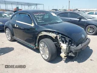 ✅ 2013 Volkswagen Beetle 2.5L • VIN: 3VWHX7AT3DM603962 • Lot: 42329256. Listed on IAAI with 137,285 mi. Free auction sales archive from the USA and detailed vehicle history report at DreamBid. Image 1.