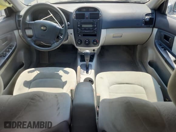 ✅ 2005 Kia Spectra LX • VIN: KNAFE121255097281 • Lot: 80794205. Wystawiony na Copart z przebiegiem 155 400 mil. Bezpłatny archiwum sprzedaży aukcyjnych z USA i szczegółowy raport historii pojazdu na DreamBid. Zdjęcie 8.