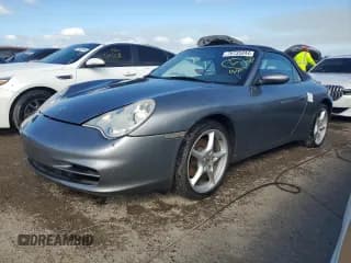 ✅ 2003 Porsche 911 • VIN: WP0CA29903S651323 • Лот: 78735344. Опубликован ранее на Copart с пробегом 30 544 миль. Бесплатный доступ к архиву аукционных продаж из США и подробный отчёт об истории автомобиля на DreamBid. Изображение 1.