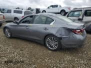 ✅ 2018 Infiniti Q50 Luxe • VIN: JN1EV7AP0JM360393 • Lot: 93946345. Listed on Copart with 70,112 mi. Free auction sales archive from the USA and detailed vehicle history report at DreamBid. Image 2.