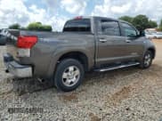 ✅ 2011 Toyota Tundra Limited • VIN: 5TFFY5F11BX106127 • Lot: 64842755. Listed on Copart with 215,156 mi. Free auction sales archive from the USA and detailed vehicle history report at DreamBid. Image 3.