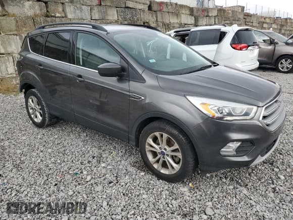 ✅ 2017 Ford Escape SE • VIN: 1FMCU0G90HUD75568 • Lot: 80661805. Listed on Copart with 172,792 mi. Free auction sales archive from the USA and detailed vehicle history report at DreamBid. Image 4.