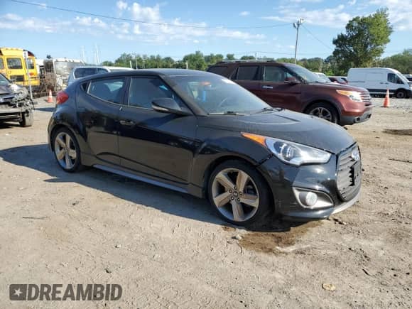 2013 Hyundai Veloster Turbo z VIN KMHTC6AE7DU166690, wystawiony jako Copart lot #70153245 z przebiegiem 206 496 mil mil oraz Czysty tytuł • Clean title. Historia ofert i sprzedaży dostępna na DreamBid. Obrazek 4.