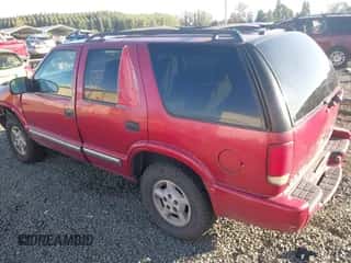 2000 Chevrolet Blazer LT z VIN 1GNDT13W6Y2243611, wystawiony jako IAAI lot #43242790 z przebiegiem 251 823 mil mil oraz . Historia ofert i sprzedaży dostępna na DreamBid. Obrazek 3.